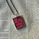 Snoopy, comic strip illustrations from vintage Peanuts book, up-cycled to hand-soldered glass pendant