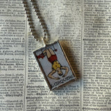 Acrobat and clown, vintage Loteria card illustrations, up-cycled to soldered glass pendant
