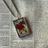 Acrobat and clown, vintage Loteria card illustrations, up-cycled to soldered glass pendant