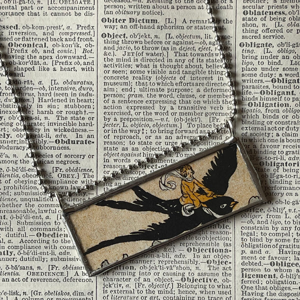 1 Boy riding a raven, vintage children's book illustration, up-cycled to hand-soldered glass pendant