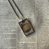 apple and orange vintage fruit illustrations up-cycled to soldered glass pendant