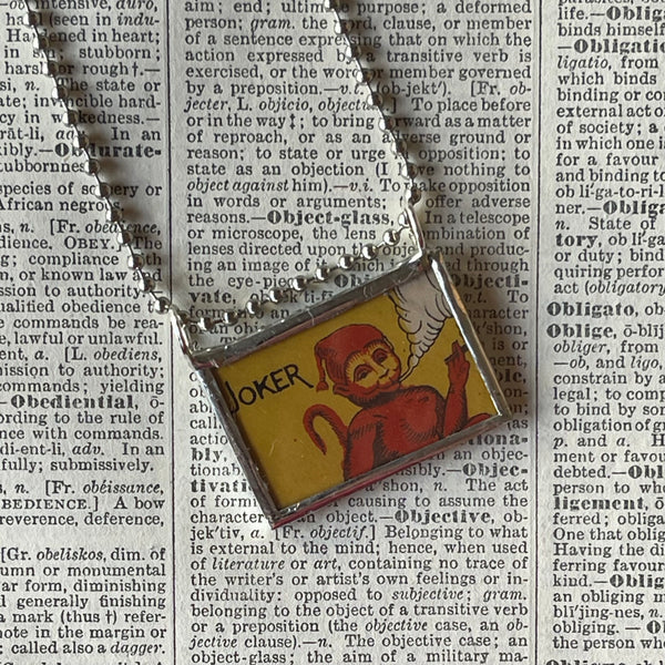 1 Smoking monkey, wheel graphics, vintage illustrations up-cycled to soldered glass pendant