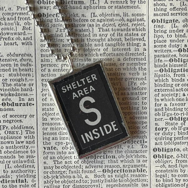 Vintage safety graphics, circa 1920s, up-cycled to soldered glass pendant