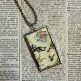 Vintage tattoo flash illustrations, upcycled to hand-soldered glass pendant