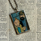 Tintin and Captain Haddock, original vintage 1960s book illustrations, upcycled to soldered glass pendant