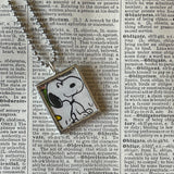 Snoopy, comic strip illustrations from vintage Peanuts book, up-cycled to hand-soldered glass pendant