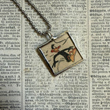 Bugs Bunny and Daffy Duck vintage 1970s comic illustration, upcycled to soldered hand-soldered glass pendant