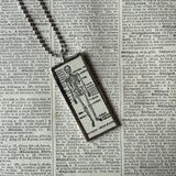 Skeleton, vintage dictionary illustrations, up-cycled to soldered glass pendant