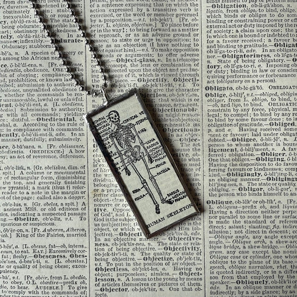 Skeleton, vintage dictionary illustrations, up-cycled to soldered glass pendant