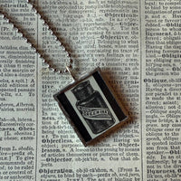 Ink bottle, advertising illustrations up-cycled to soldered glass pendant