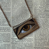 Human eye, vintage illustration upcycled to hand-soldered glass pendant