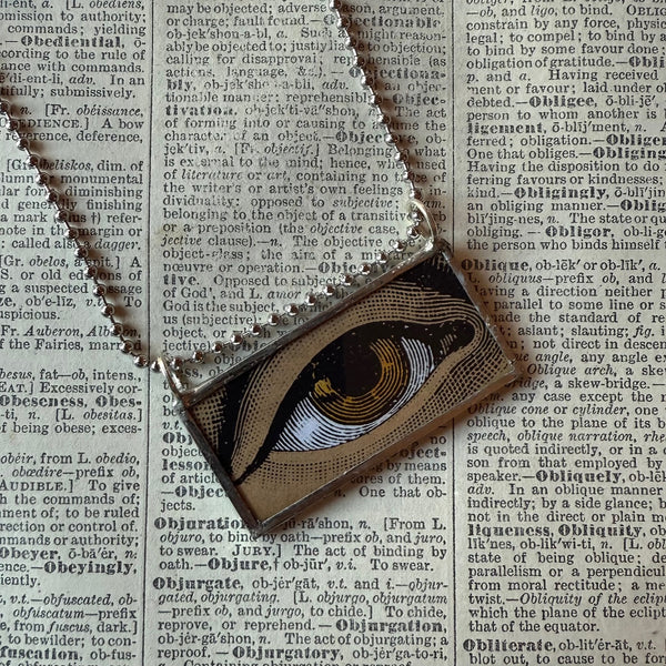 Human eye, vintage illustration upcycled to hand-soldered glass pendant
