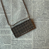 Human eye, vintage illustration upcycled to hand-soldered glass pendant
