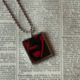 Emily the Strange, vintage illustrations up-cycled to soldered glass pendant