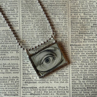 Human eye, vintage illustration upcycled to hand-soldered glass pendant