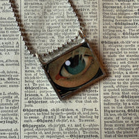 Human eye, vintage illustration upcycled to hand-soldered glass pendant