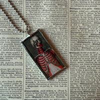 Anatomical skeleton, vintage illustrations upcycled to hand-soldered glass pendant