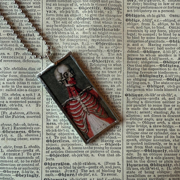 Anatomical skeleton, vintage illustrations upcycled to hand-soldered glass pendant