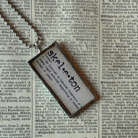 Anatomical skeleton, vintage illustrations upcycled to hand-soldered glass pendant