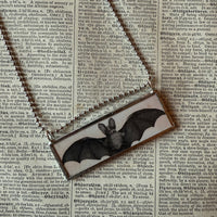Vampire bat, vintage illustrations upcycled to hand-soldered glass pendant