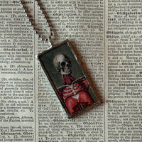 Anatomical skeleton, vintage illustrations upcycled to hand-soldered glass pendant