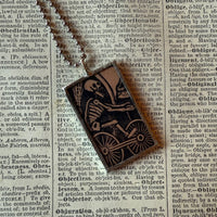 Skeleton / Skull, vintage illustrations up-cycled to soldered glass pendant