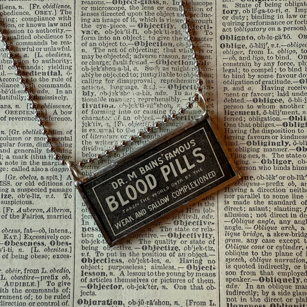 Vintage Blood Pills, vintage Sears Catalog illustrations, upcycled to hand soldered glass pendant