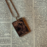 Skeleton / Skull, vintage illustrations up-cycled to soldered glass pendant
