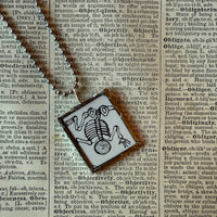 Skeleton / Skull, vintage illustrations up-cycled to soldered glass pendant