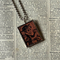 Poison / Skull and crossbones, vintage illustration up-cycled to soldered glass pendant