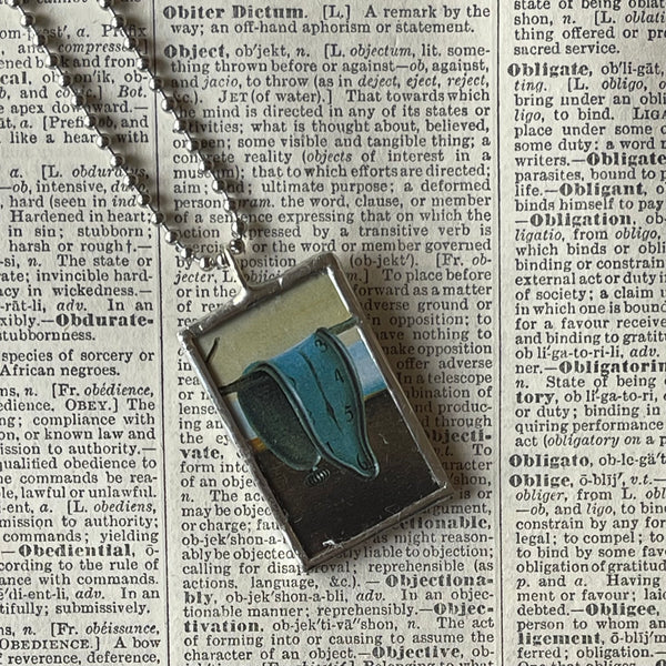 1 Salvador Dali, Persistence of Memory painting, upcycled to hand soldered glass pendant
