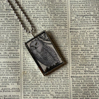 Snowy Owls, vintage illustrations up-cycled to soldered glass pendant
