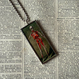 Anatomical skeleton, vintage illustrations upcycled to hand-soldered glass pendant