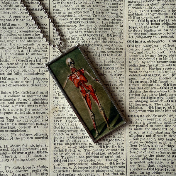 Anatomical skeleton, vintage illustrations upcycled to hand-soldered glass pendant