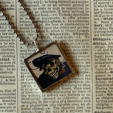 Skulls, vintage illustration up-cycled to soldered glass pendant