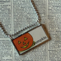 Skeleton, pumpkin vintage illustrations upcycled to hand-soldered glass pendant