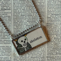 Skeleton, pumpkin vintage illustrations upcycled to hand-soldered glass pendant