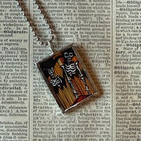 Skeleton concept art illustrations, up-cycled to soldered glass pendant