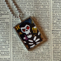 Skeleton concept art illustrations, up-cycled to soldered glass pendant