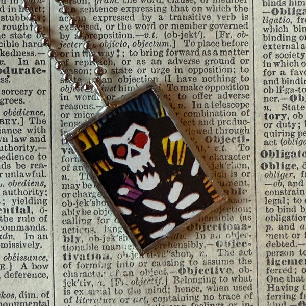 Skeleton concept art illustrations, up-cycled to soldered glass pendant