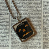 Jack O'Lantern pumpkin, witch, vintage illustrations, up-cycled to soldered glass pendant