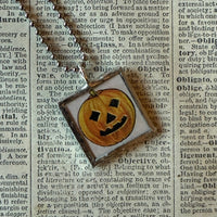 Jack O'Lanterns, pumpkins, vintage illustrations, up-cycled to soldered glass pendant