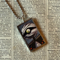 Mummy, eyeball, concept art illustrations, up-cycled to soldered glass pendant