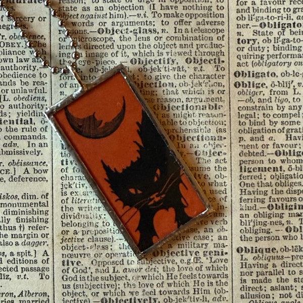 Black cats, vintage illustrations, up-cycled to soldered glass pendant