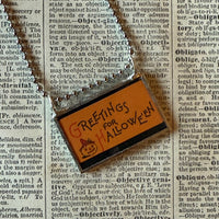 Jack O'Lantern pumpkins, vintage halloween illustrations upcycled to hand-soldered glass pendant