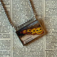 Jack O'Lantern pumpkins, vintage halloween illustrations upcycled to hand-soldered glass pendant