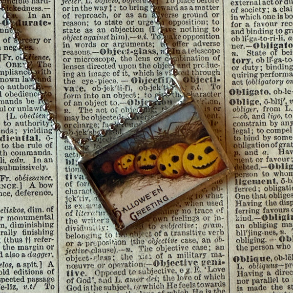 Jack O'Lantern pumpkins, vintage halloween illustrations upcycled to hand-soldered glass pendant