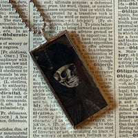 Fancy skeletons, vintage halloween illustrations, up-cycled to soldered glass pendant