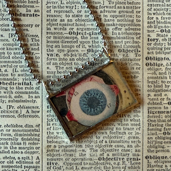 Human eye, vintage anatomical illustrations upcycled to hand-soldered glass pendant
