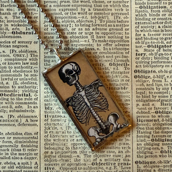 Skeleton / Skull, vintage illustrations up-cycled to soldered glass pendant